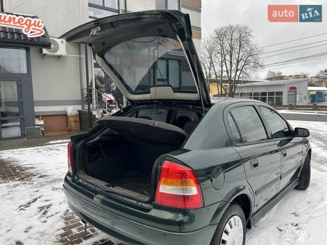 Зелений Опель Астра, об'ємом двигуна 1.4 л та пробігом 325 тис. км за 2350 $, фото 10 на Automoto.ua