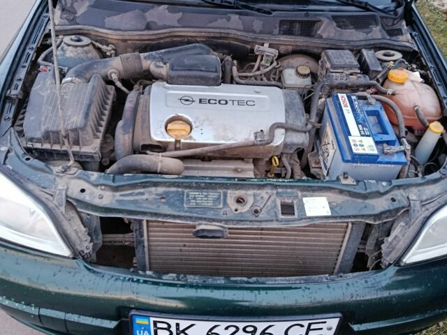 Зелений Опель Астра, об'ємом двигуна 1.4 л та пробігом 335 тис. км за 1850 $, фото 19 на Automoto.ua