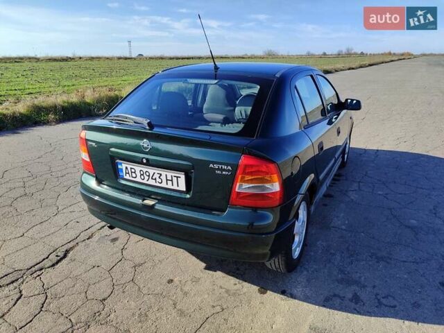Зеленый Опель Астра, объемом двигателя 1.6 л и пробегом 211 тыс. км за 4300 $, фото 11 на Automoto.ua