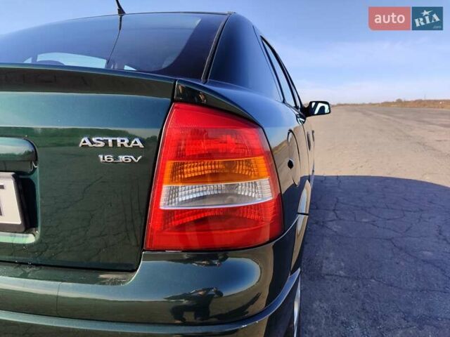 Зеленый Опель Астра, объемом двигателя 1.6 л и пробегом 211 тыс. км за 4300 $, фото 12 на Automoto.ua