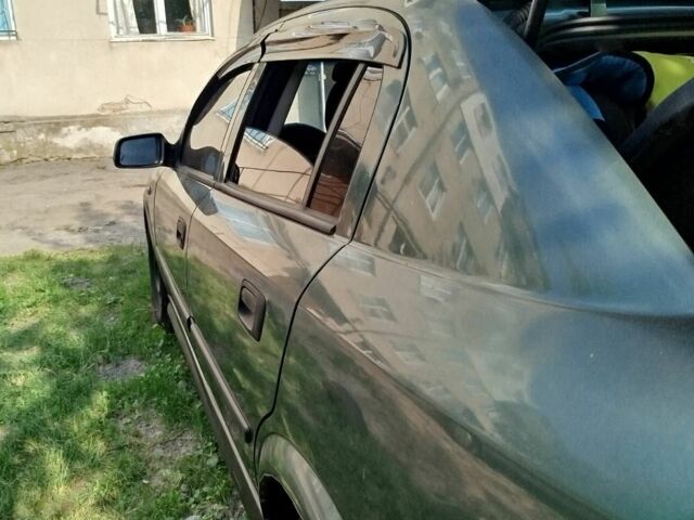 Зеленый Опель Астра, объемом двигателя 1.6 л и пробегом 293 тыс. км за 2800 $, фото 2 на Automoto.ua