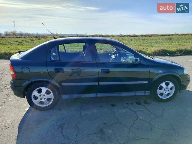 Зеленый Опель Астра, объемом двигателя 1.6 л и пробегом 211 тыс. км за 4300 $, фото 14 на Automoto.ua