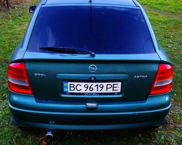 Зеленый Опель Астра, объемом двигателя 1.6 л и пробегом 293 тыс. км за 2800 $, фото 2 на Automoto.ua