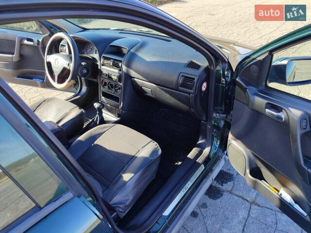 Зеленый Опель Астра, объемом двигателя 1.6 л и пробегом 211 тыс. км за 4300 $, фото 22 на Automoto.ua