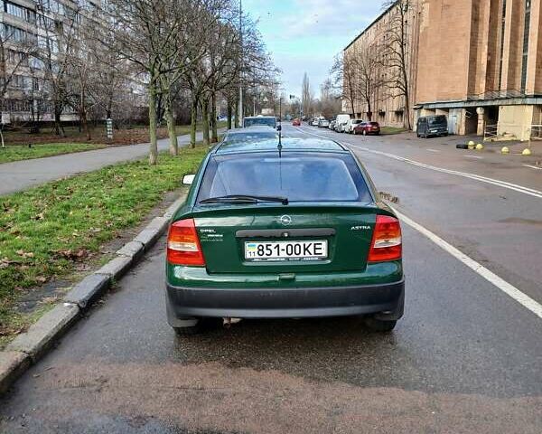 Зеленый Опель Астра, объемом двигателя 1.2 л и пробегом 84 тыс. км за 3000 $, фото 4 на Automoto.ua
