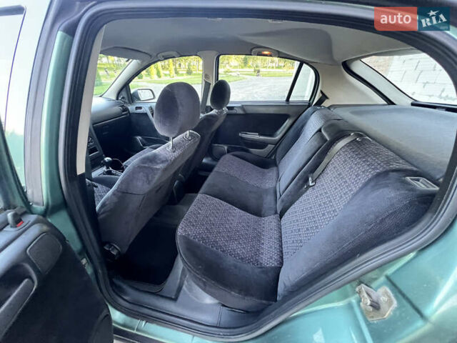 Зеленый Опель Астра, объемом двигателя 1.6 л и пробегом 205 тыс. км за 2500 $, фото 12 на Automoto.ua
