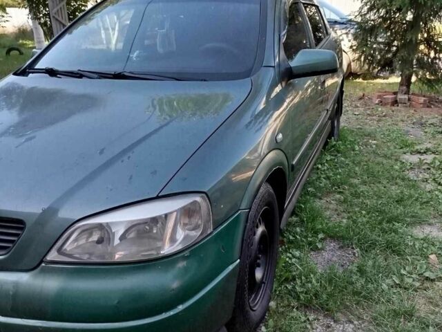 Зеленый Опель Астра, объемом двигателя 1.6 л и пробегом 293 тыс. км за 2800 $, фото 5 на Automoto.ua