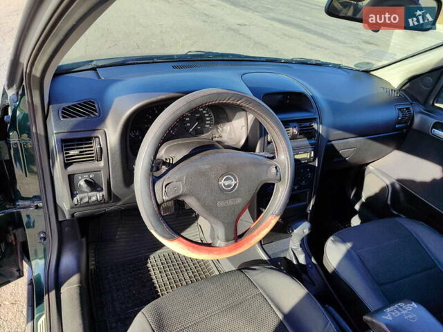 Зеленый Опель Астра, объемом двигателя 1.6 л и пробегом 211 тыс. км за 4300 $, фото 21 на Automoto.ua