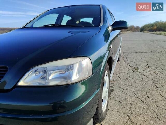 Зеленый Опель Астра, объемом двигателя 1.6 л и пробегом 211 тыс. км за 4300 $, фото 3 на Automoto.ua