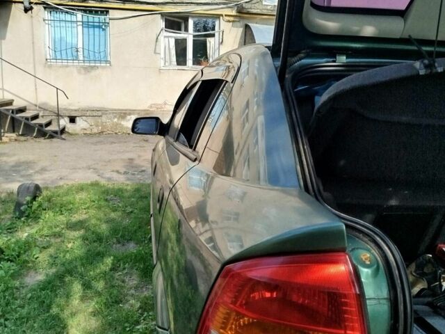Зеленый Опель Астра, объемом двигателя 1.6 л и пробегом 293 тыс. км за 2800 $, фото 4 на Automoto.ua