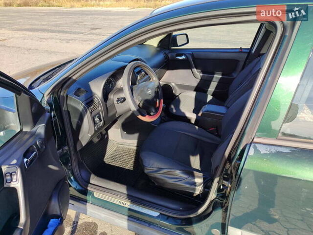 Зеленый Опель Астра, объемом двигателя 1.6 л и пробегом 211 тыс. км за 4300 $, фото 20 на Automoto.ua