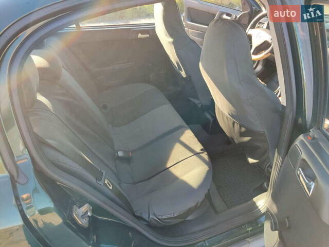 Зеленый Опель Астра, объемом двигателя 1.6 л и пробегом 211 тыс. км за 4300 $, фото 24 на Automoto.ua