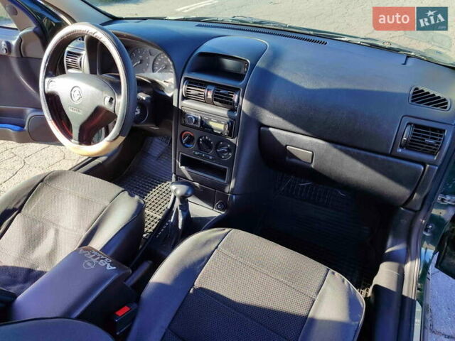 Зеленый Опель Астра, объемом двигателя 1.6 л и пробегом 211 тыс. км за 4300 $, фото 23 на Automoto.ua