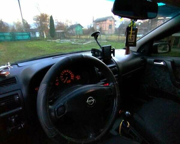 Зеленый Опель Астра, объемом двигателя 1.6 л и пробегом 293 тыс. км за 2800 $, фото 6 на Automoto.ua