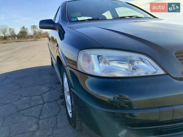 Зеленый Опель Астра, объемом двигателя 1.6 л и пробегом 211 тыс. км за 4300 $, фото 16 на Automoto.ua