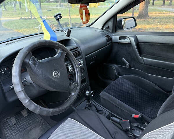 Зеленый Опель Астра, объемом двигателя 1.2 л и пробегом 258 тыс. км за 3500 $, фото 8 на Automoto.ua