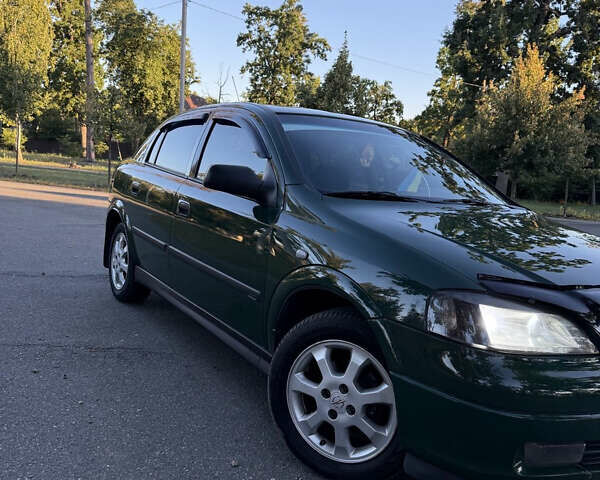 Зеленый Опель Астра, объемом двигателя 1.2 л и пробегом 258 тыс. км за 3500 $, фото 12 на Automoto.ua