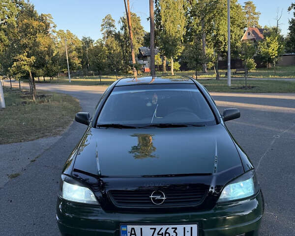 Зеленый Опель Астра, объемом двигателя 1.2 л и пробегом 258 тыс. км за 3500 $, фото 6 на Automoto.ua