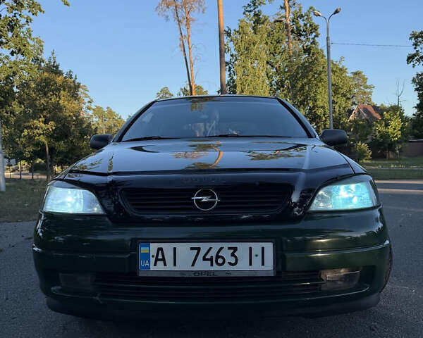 Зеленый Опель Астра, объемом двигателя 1.2 л и пробегом 258 тыс. км за 3500 $, фото 2 на Automoto.ua
