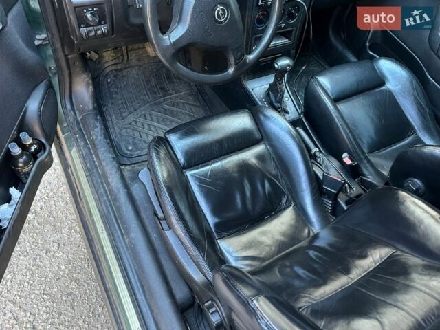 Зелений Опель Астра, об'ємом двигуна 2 л та пробігом 355 тис. км за 2500 $, фото 5 на Automoto.ua
