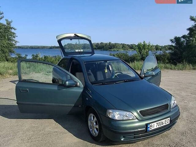 Зеленый Опель Астра, объемом двигателя 1.6 л и пробегом 303 тыс. км за 3399 $, фото 1 на Automoto.ua