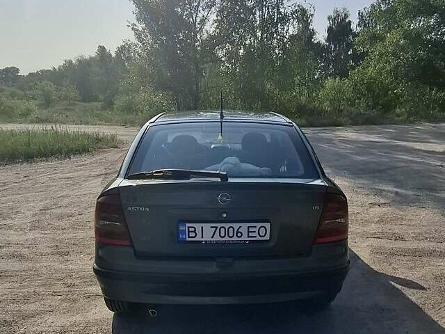 Зеленый Опель Астра, объемом двигателя 1.6 л и пробегом 303 тыс. км за 3399 $, фото 4 на Automoto.ua