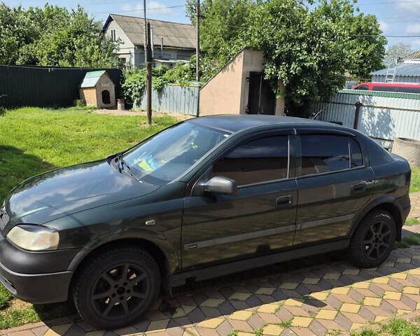 Зеленый Опель Астра, объемом двигателя 2 л и пробегом 425 тыс. км за 1950 $, фото 3 на Automoto.ua