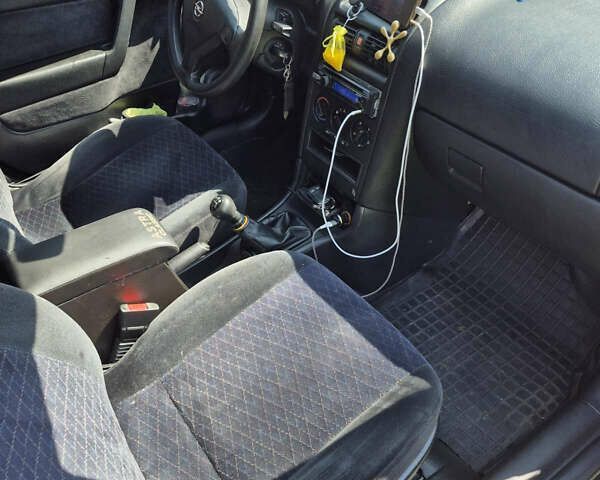 Зеленый Опель Астра, объемом двигателя 2 л и пробегом 425 тыс. км за 1950 $, фото 1 на Automoto.ua