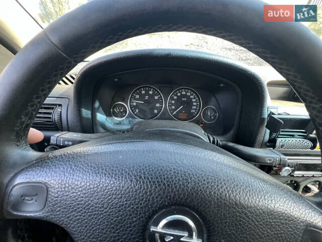 Зеленый Опель Астра, объемом двигателя 1.6 л и пробегом 350 тыс. км за 2300 $, фото 18 на Automoto.ua