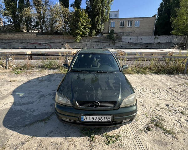 Зеленый Опель Астра, объемом двигателя 1.6 л и пробегом 350 тыс. км за 2300 $, фото 1 на Automoto.ua