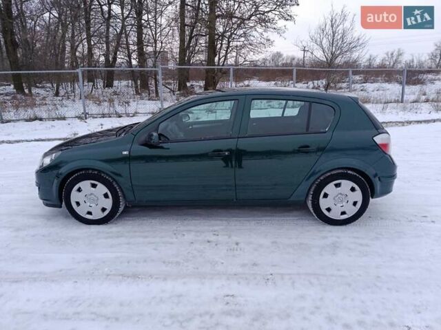 Зелений Опель Астра, об'ємом двигуна 1.4 л та пробігом 211 тис. км за 4450 $, фото 7 на Automoto.ua