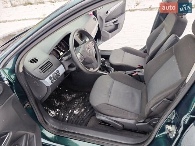 Зелений Опель Астра, об'ємом двигуна 1.4 л та пробігом 211 тис. км за 4450 $, фото 10 на Automoto.ua