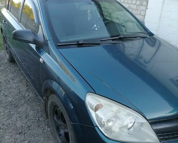 Зеленый Опель Астра, объемом двигателя 1.6 л и пробегом 243 тыс. км за 4500 $, фото 2 на Automoto.ua