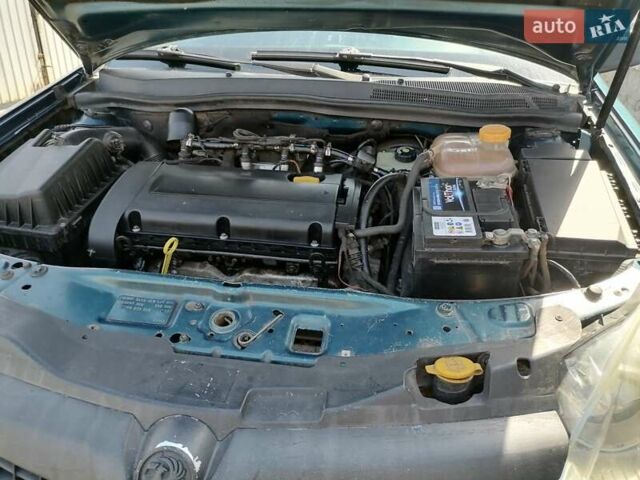 Зеленый Опель Астра, объемом двигателя 1.6 л и пробегом 243 тыс. км за 4500 $, фото 7 на Automoto.ua