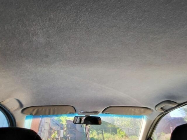 Зелений Опель Астра, об'ємом двигуна 1.4 л та пробігом 250 тис. км за 2500 $, фото 6 на Automoto.ua