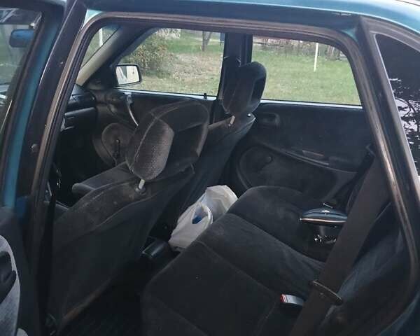 Зеленый Опель Астра, объемом двигателя 1.6 л и пробегом 317 тыс. км за 1500 $, фото 6 на Automoto.ua