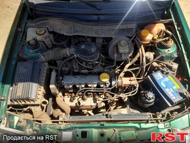 Зелений Опель Астра, об'ємом двигуна 1.4 л та пробігом 211 тис. км за 1500 $, фото 4 на Automoto.ua