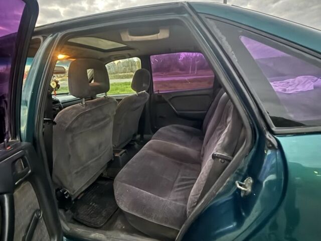 Зеленый Опель Астра, объемом двигателя 1.6 л и пробегом 491 тыс. км за 850 $, фото 5 на Automoto.ua