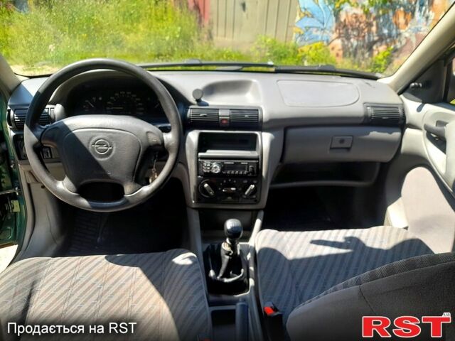 Зелений Опель Астра, об'ємом двигуна 1.4 л та пробігом 211 тис. км за 1500 $, фото 3 на Automoto.ua