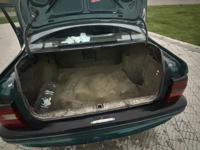 Зеленый Опель Астра, объемом двигателя 1.6 л и пробегом 491 тыс. км за 850 $, фото 6 на Automoto.ua