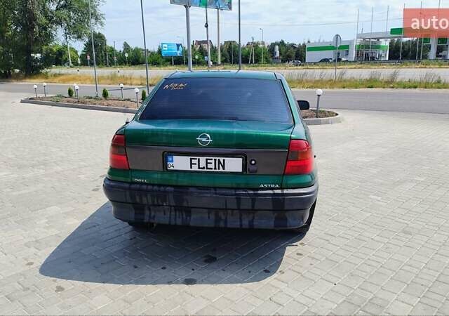 Зеленый Опель Астра, объемом двигателя 1.4 л и пробегом 400 тыс. км за 1700 $, фото 3 на Automoto.ua