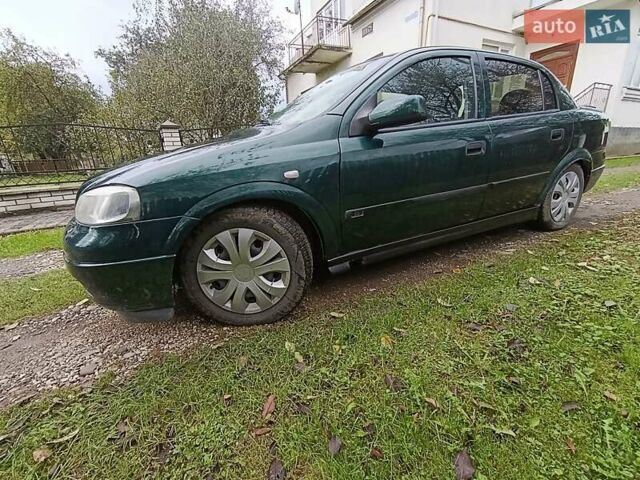 Зеленый Опель Астра, объемом двигателя 1.6 л и пробегом 314 тыс. км за 2450 $, фото 6 на Automoto.ua