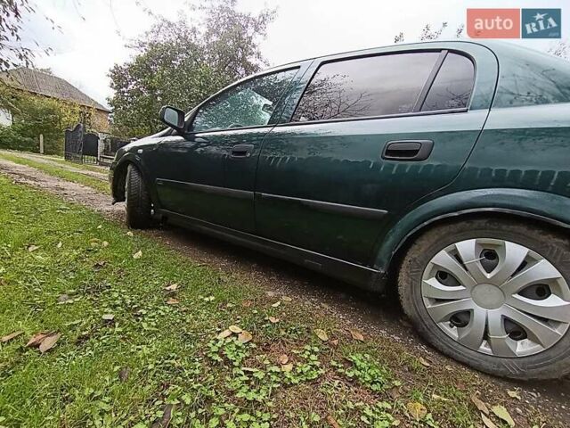Зеленый Опель Астра, объемом двигателя 1.6 л и пробегом 314 тыс. км за 2450 $, фото 4 на Automoto.ua
