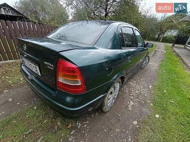 Зеленый Опель Астра, объемом двигателя 1.6 л и пробегом 314 тыс. км за 2450 $, фото 9 на Automoto.ua