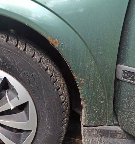 Зеленый Опель Астра, объемом двигателя 1.6 л и пробегом 410 тыс. км за 2900 $, фото 13 на Automoto.ua