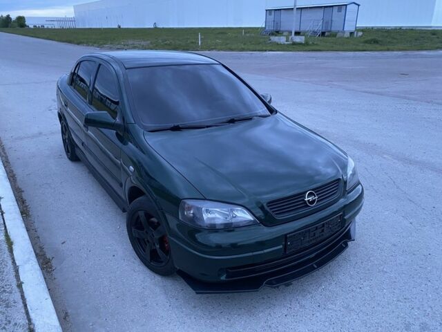 Зеленый Опель Астра, объемом двигателя 1.4 л и пробегом 220 тыс. км за 3650 $, фото 6 на Automoto.ua
