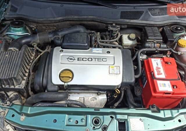 Зеленый Опель Астра, объемом двигателя 1.6 л и пробегом 410 тыс. км за 2900 $, фото 15 на Automoto.ua