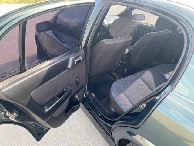 Зеленый Опель Астра, объемом двигателя 1.4 л и пробегом 220 тыс. км за 3650 $, фото 5 на Automoto.ua