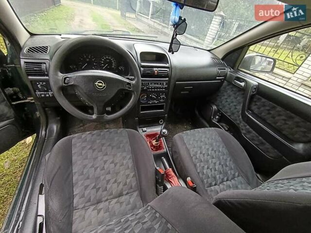 Зеленый Опель Астра, объемом двигателя 1.6 л и пробегом 314 тыс. км за 2450 $, фото 14 на Automoto.ua