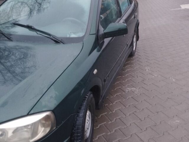 Зеленый Опель Астра, объемом двигателя 1.4 л и пробегом 300 тыс. км за 2400 $, фото 2 на Automoto.ua